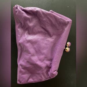 Asymmetrical purple clutch